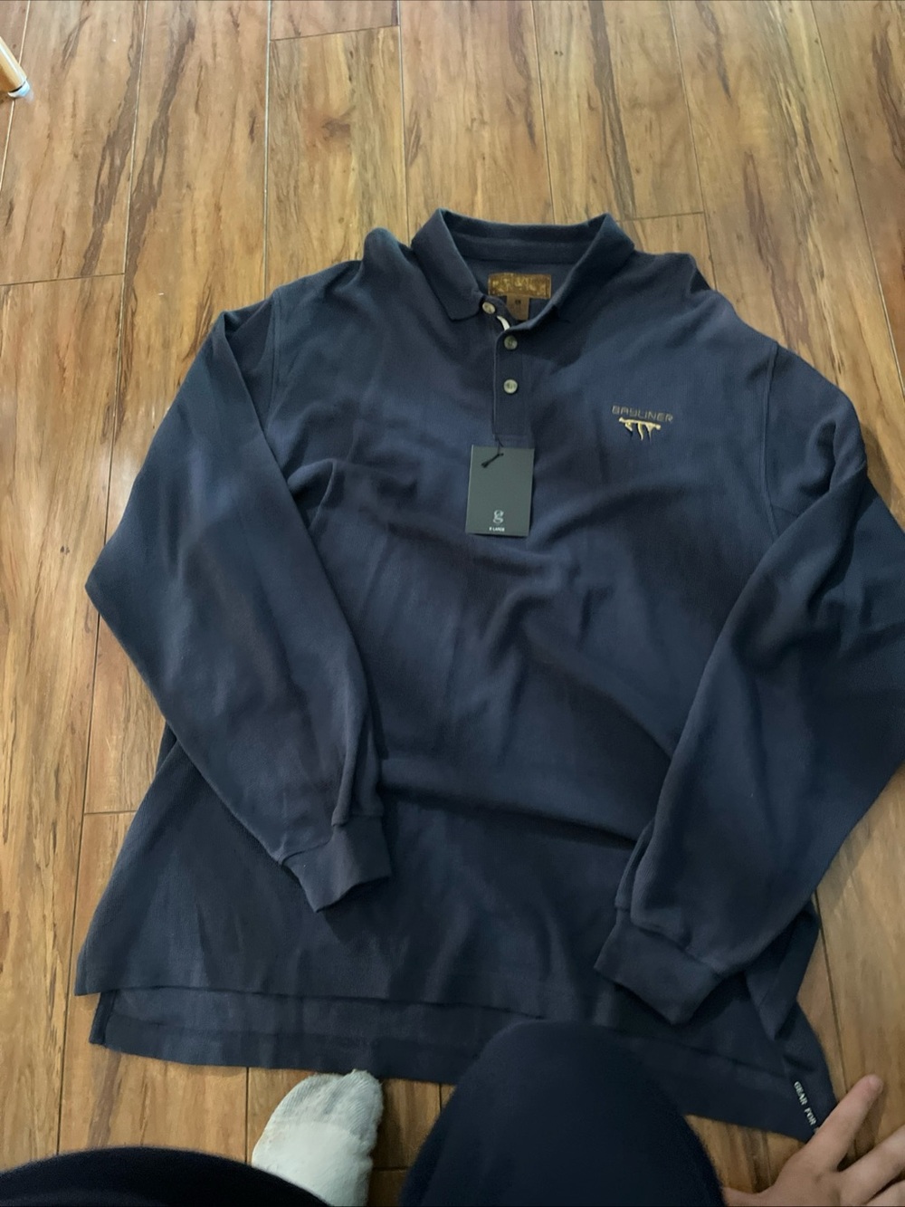 Classic Navy Long-Sleeve Polo with Subtle Chest Emblem